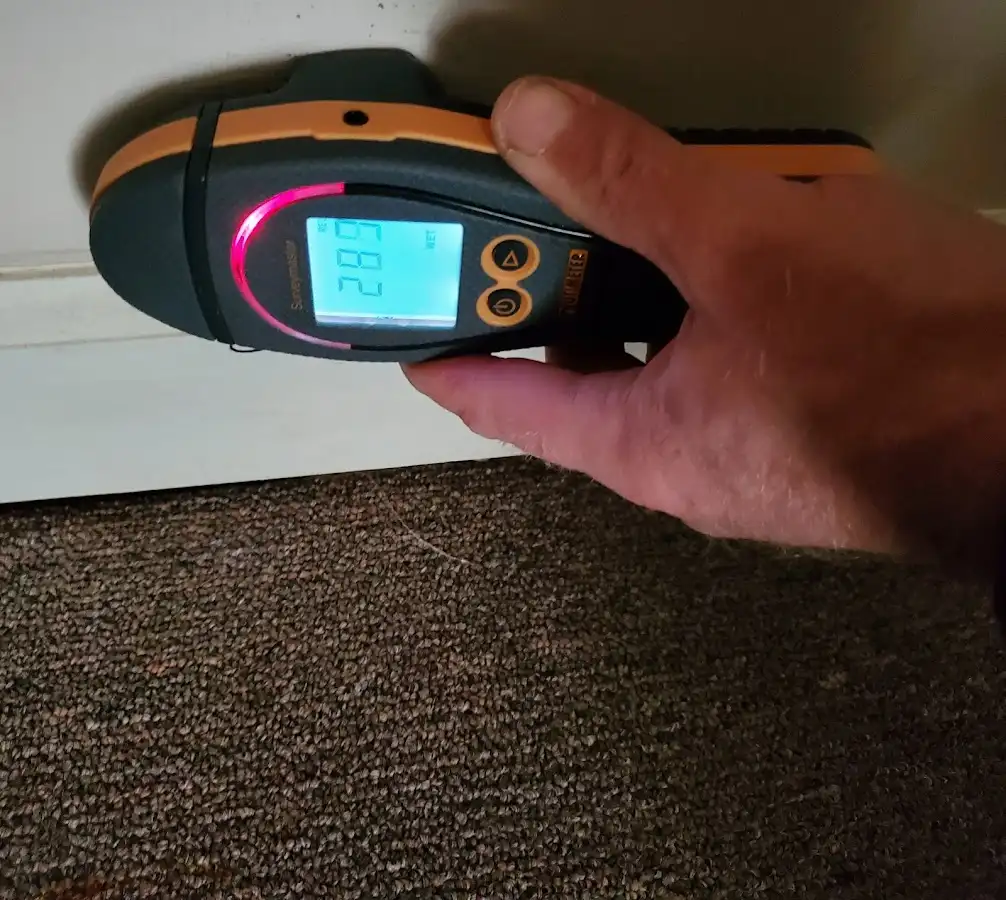 Moisture detection at baseboard during Burst Pipe Cleanup in Roeland Park